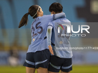 Aoba Fujino #20 of Manchester City W.F.C. celebrates her goal with Yui Hasegawa #25 of Manchester City W.F.C. during the UEFA Champions Leag...