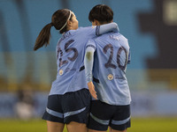 Aoba Fujino #20 of Manchester City W.F.C. celebrates her goal with Yui Hasegawa #25 of Manchester City W.F.C. during the UEFA Champions Leag...