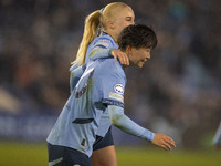 Aoba Fujino #20 of Manchester City W.F.C. celebrates her goal during the UEFA Champions League Group D match between Manchester City and Ham...