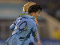 Aoba Fujino #20 of Manchester City W.F.C. celebrates her goal during the UEFA Champions League Group D match between Manchester City and Ham...