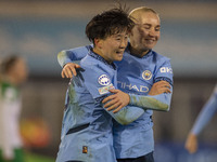 Aoba Fujino #20 of Manchester City W.F.C. celebrates her goal during the UEFA Champions League Group D match between Manchester City and Ham...