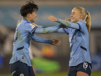 Aoba Fujino #20 of Manchester City W.F.C. celebrates her goal during the UEFA Champions League Group D match between Manchester City and Ham...