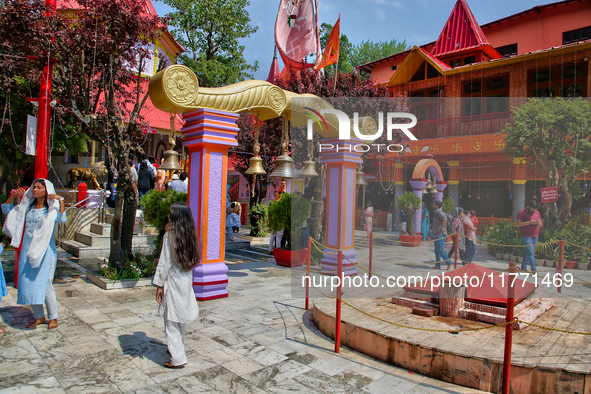 Hindu devotees visit the Maa Naina Devi Temple in Nainital, Uttarakhand, India, on April 21, 2024. Naina Devi Temple is a famous Indian pilg...