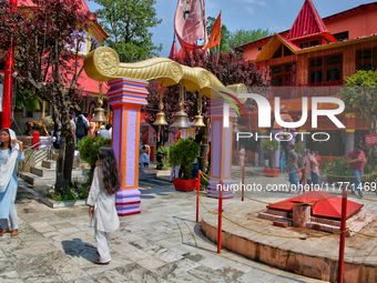 Hindu devotees visit the Maa Naina Devi Temple in Nainital, Uttarakhand, India, on April 21, 2024. Naina Devi Temple is a famous Indian pilg...