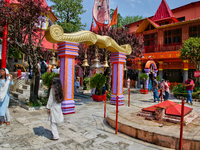 Hindu devotees visit the Maa Naina Devi Temple in Nainital, Uttarakhand, India, on April 21, 2024. Naina Devi Temple is a famous Indian pilg...