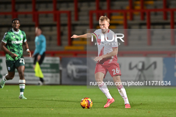 Eli King, 26, from Stevenage, controls the ball during the EFL Trophy match between Stevenage and Gillingham at the Lamex Stadium in Stevena...