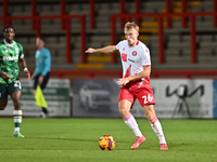 Eli King, 26, from Stevenage, controls the ball during the EFL Trophy match between Stevenage and Gillingham at the Lamex Stadium in Stevena...