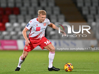 Lewis Freestone, number 16 for Stevenage, controls the ball during the EFL Trophy match between Stevenage and Gillingham at the Lamex Stadiu...