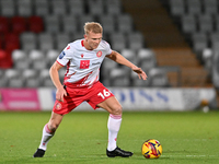 Lewis Freestone, number 16 for Stevenage, controls the ball during the EFL Trophy match between Stevenage and Gillingham at the Lamex Stadiu...