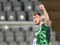 Josh Andrews (9 Gillingham) gestures to fans after scoring during the EFL Trophy match between Stevenage and Gillingham at the Lamex Stadium...