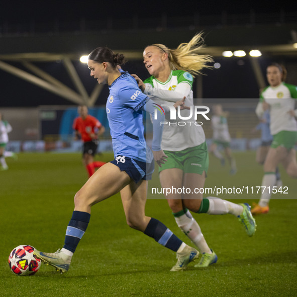 Lily Murphy, number 46 of Manchester City W.F.C., is tackled by an opponent during the UEFA Champions League Group D match between Mancheste...