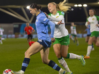 Lily Murphy, number 46 of Manchester City W.F.C., is tackled by an opponent during the UEFA Champions League Group D match between Mancheste...