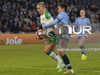 Mary Fowler #8 of Manchester City W.F.C. challenges the opponent during the UEFA Champions League Group D match between Manchester City and...