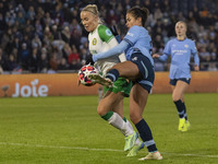 Mary Fowler #8 of Manchester City W.F.C. challenges the opponent during the UEFA Champions League Group D match between Manchester City and...