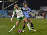 Stina Lennartsson #17 of Hammarby IF is tackled by the opponent during the UEFA Champions League Group D match between Manchester City and H...