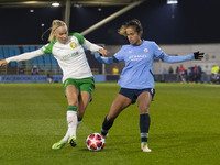 Stina Lennartsson #17 of Hammarby IF is tackled by the opponent during the UEFA Champions League Group D match between Manchester City and H...