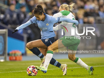 Mary Fowler #8 of Manchester City W.F.C. is tackled by the opponent during the UEFA Champions League Group D match between Manchester City a...