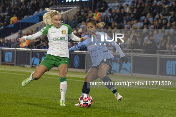 Mary Fowler #8 of Manchester City W.F.C. is challenged by the opponent during the UEFA Champions League Group D match between Manchester Cit...