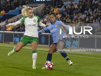 Mary Fowler #8 of Manchester City W.F.C. is challenged by the opponent during the UEFA Champions League Group D match between Manchester Cit...