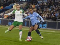 Mary Fowler #8 of Manchester City W.F.C. is challenged by the opponent during the UEFA Champions League Group D match between Manchester Cit...