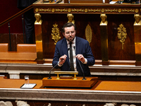 Philippe Brun, deputy of the Socialistes et Apparentes group, speaks during the public session of the solemn vote on the first part of the f...