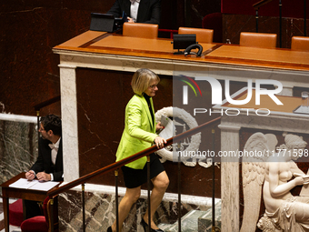 Veronique Louwagie, deputy of the Droite Republicaine group, stands before speaking during the public session of the solemn vote on the firs...