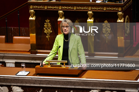 Veronique Louwagie, deputy of the Droite Republicaine group, stands before speaking during the public session of the solemn vote on the firs...