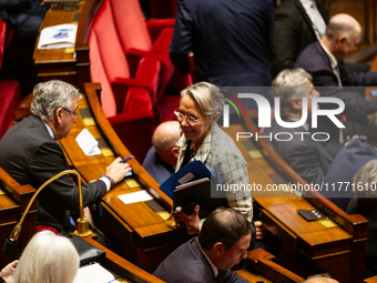 Elisabeth Borne, MP deputy of the Ensemble pour la Republique group, is seen during the public session of the solemn vote on the first part...