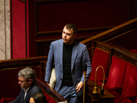 Louis Boyard, MP deputy of the La France Insoumise- Nouveau Front Populaire group, is seen during the public session of the solemn vote on t...