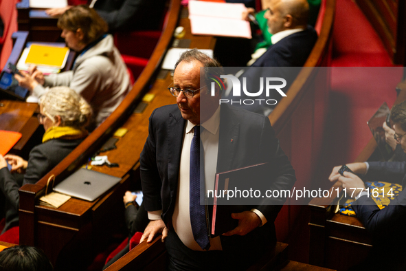 Francois Hollande, MP deputy of the Socialistes et Apparentes group, is seen during the public session of the solemn vote on the first part...