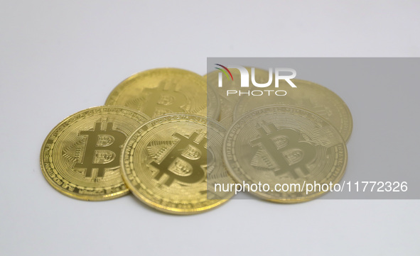 A photo taken on November 13, 2024, shows bitcoins in Huaian, Jiangsu province, China. 