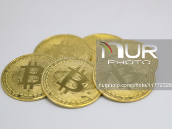 A photo taken on November 13, 2024, shows bitcoins in Huaian, Jiangsu province, China. (