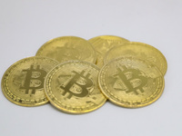 A photo taken on November 13, 2024, shows bitcoins in Huaian, Jiangsu province, China. (