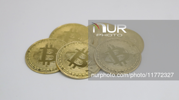 A photo taken on November 13, 2024, shows bitcoins in Huaian, Jiangsu province, China. 