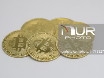 A photo taken on November 13, 2024, shows bitcoins in Huaian, Jiangsu province, China. (