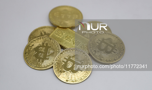 A photo taken on November 13, 2024, shows bitcoins in Huaian, Jiangsu province, China. 