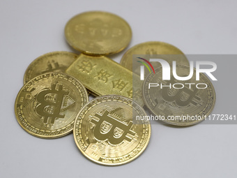 A photo taken on November 13, 2024, shows bitcoins in Huaian, Jiangsu province, China. (