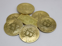 A photo taken on November 13, 2024, shows bitcoins in Huaian, Jiangsu province, China. (