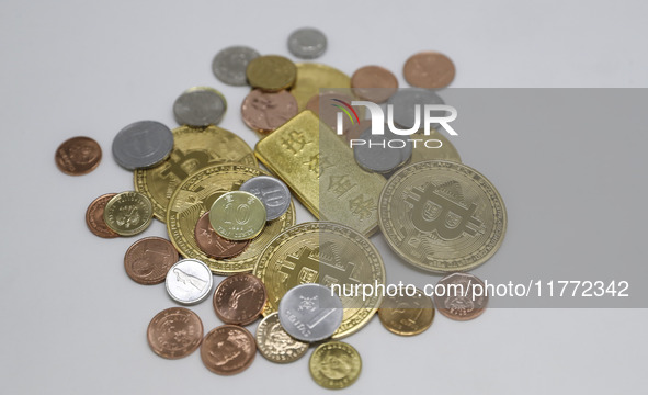 A photo taken on November 13, 2024, shows bitcoins in Huaian, Jiangsu province, China. 