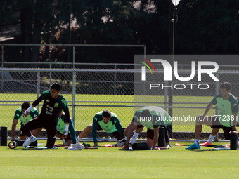 Players of the Mexican national soccer team perform warm-up exercises during a training session before their Concacaf Nations League match a...