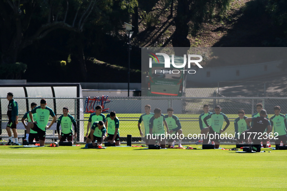 Players of the Mexican national soccer team perform warm-up exercises during a training session before their Concacaf Nations League match a...