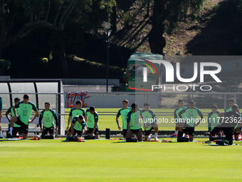 Players of the Mexican national soccer team perform warm-up exercises during a training session before their Concacaf Nations League match a...