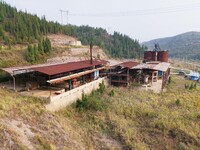 An aerial photo shows an abandoned factory in a mountain in Cengong County, Qiandongnan Miao and Dong Autonomous Prefecture, Southwest China...