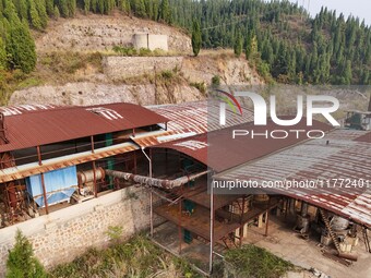 An aerial photo shows an abandoned factory in a mountain in Cengong County, Qiandongnan Miao and Dong Autonomous Prefecture, Southwest China...