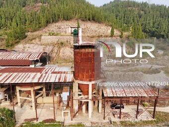 An aerial photo shows an abandoned factory in a mountain in Cengong County, Qiandongnan Miao and Dong Autonomous Prefecture, Southwest China...