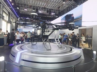 Visitors view the electric vertical take-off and landing unmanned manned aircraft (eVTOL) of Aeroht's split flying car at the 2024 Zhuhai Ai...