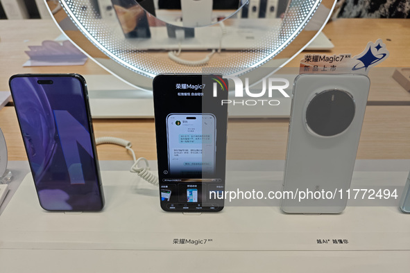 The newly released Maigic7 mobile phones are displayed at the Honor Mobile phone store in Shanghai, China, on November 13, 2024. 