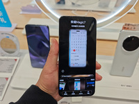 A user experiences Honor's newly released Maigic7 mobile phone at the Honor Mobile store in Shanghai, China, on November 13, 2024. (