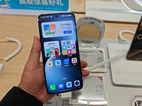 A user experiences Honor's newly released Maigic7 mobile phone at the Honor Mobile store in Shanghai, China, on November 13, 2024. (