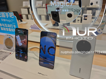 The newly released Maigic7 mobile phones are displayed at the Honor Mobile phone store in Shanghai, China, on November 13, 2024. (